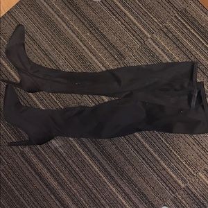 Black thigh high heel boots